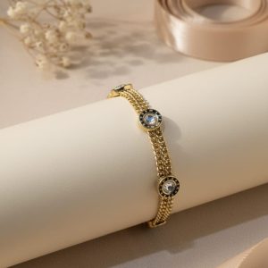 Gold charm chain bracelet.