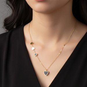 gold heart necklace.