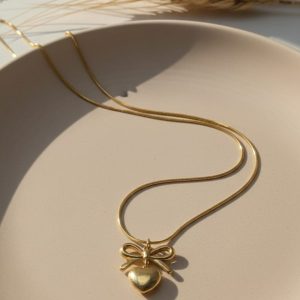 Gold bow heart necklace