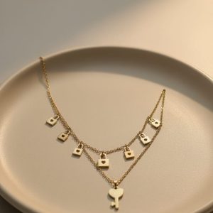 Gold padlock key necklace