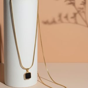 Golden rectangular pendants."